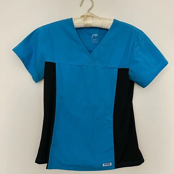 Scrub tops. - Picture 2 of 2
